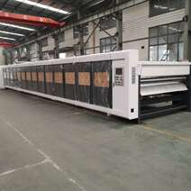 Double facer bileşeni — corrugator hattı görseli